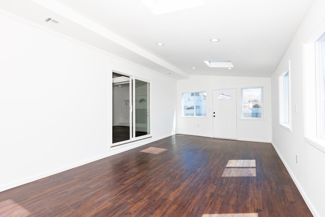 38 Melody Ln, Amityville, NY 11701 - spare room with dark wood finished floors, visible vents, recessed lighting, lofted ceiling, and baseboards