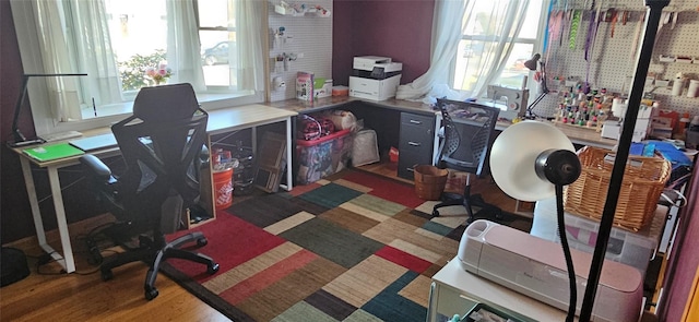office space with a wealth of natural light and wood finished floors