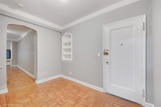 41-09 41st St, Sunnyside, NY 11104 - entrance foyer with arched walkways, baseboards, and crown molding