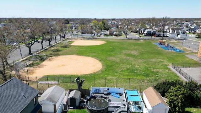 birds eye view of property with a residential view