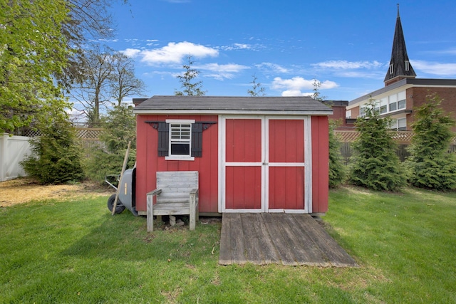 view of shed featuring a fenced backyard