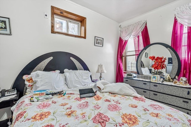 bedroom with ornamental molding