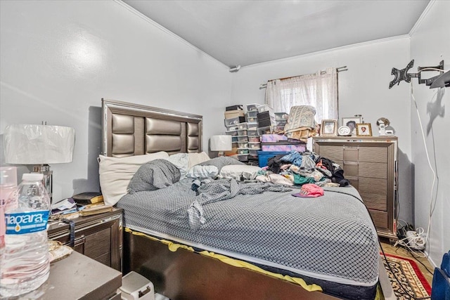 bedroom with crown molding