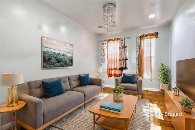living area featuring baseboards and wood finished floors