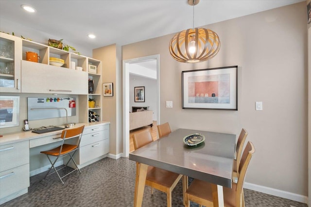15 Scarsdale Farm Rd, Scarsdale, NY 10583 - dining space featuring baseboards, dark floors, built in desk, and recessed lighting