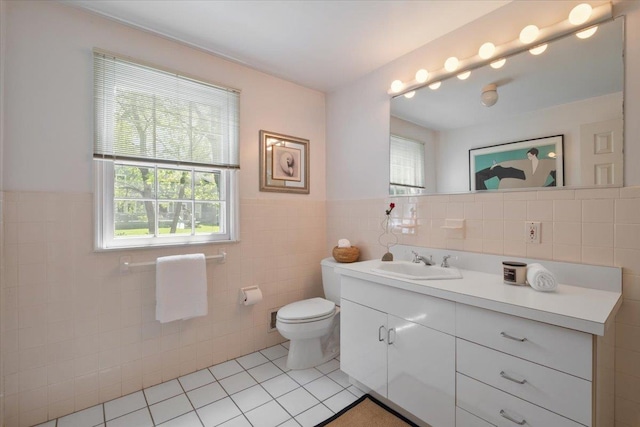 15 Scarsdale Farm Rd, Scarsdale, NY 10583 - bathroom featuring tile walls, a wealth of natural light, tile patterned flooring, and vanity