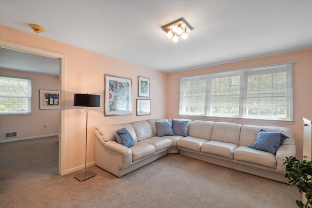 15 Scarsdale Farm Rd, Scarsdale, NY 10583 - living area with baseboards, visible vents, and light carpet