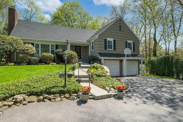 15 Scarsdale Farm Rd, Scarsdale, NY 10583 - view of front of house featuring a front lawn, a chimney, aphalt driveway, and an attached garage