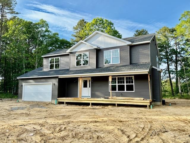 403 Moriches-Middle Island Rd, Manorville, NY 11949 - view of front of home featuring a garage