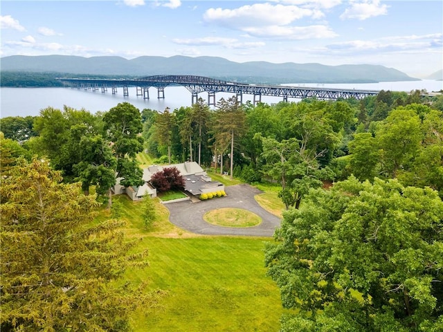 bird's eye view with a water and mountain view