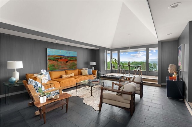 living area featuring high vaulted ceiling