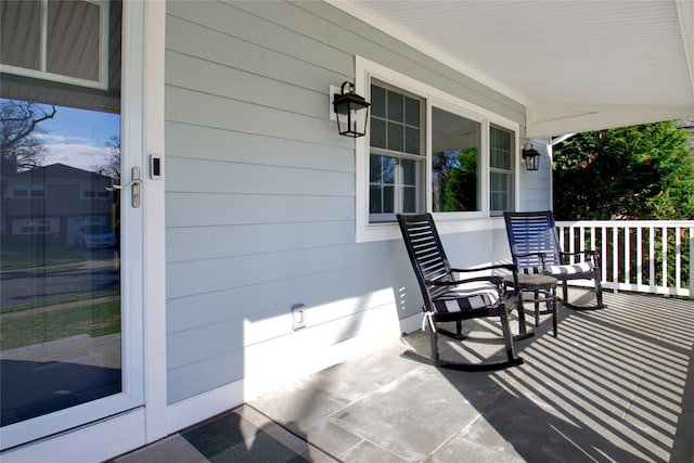 view of patio featuring a porch