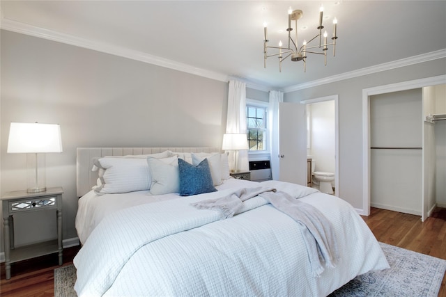 bedroom with a chandelier, wood finished floors, a closet, and ornamental molding