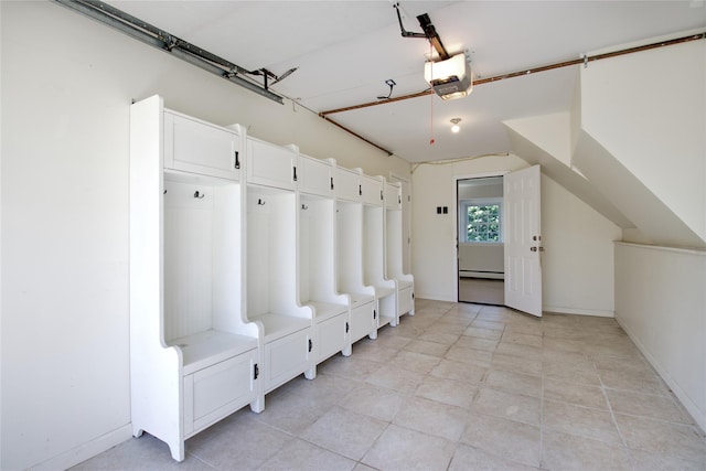 mudroom featuring baseboard heating and baseboards