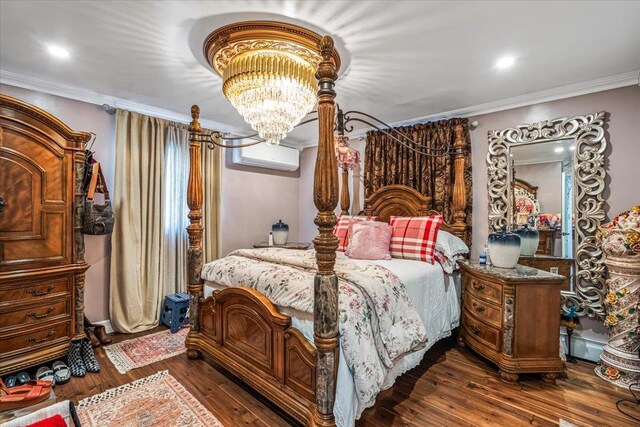 25 Snyder St, Patchogue, NY 11772 - bedroom featuring a notable chandelier, ornamental molding, and dark wood-style floors