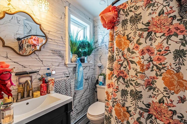 25 Snyder St, Patchogue, NY 11772 - bathroom with vanity, crown molding, and toilet