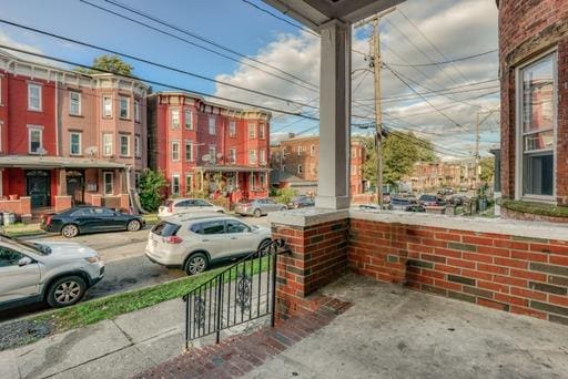 exterior space with sidewalks and curbs