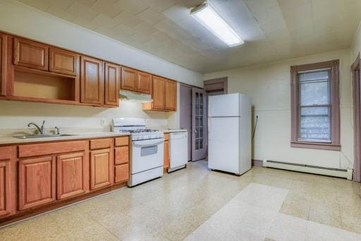 kitchen featuring a baseboard heating unit, white appliances, light countertops, under cabinet range hood, and a sink
