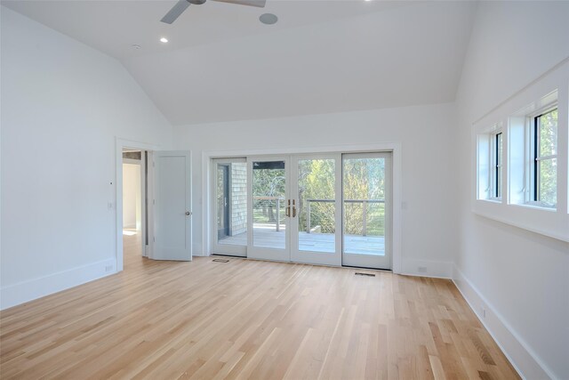 139A N Ferry Rd, Shelter Island, NY 11964 - spare room with high vaulted ceiling, light wood-type flooring, a ceiling fan, french doors, and baseboards