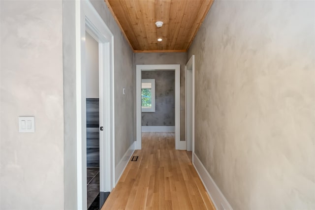 139A N Ferry Rd, Shelter Island, NY 11964 - hallway featuring wooden ceiling, light wood-style flooring, and baseboards