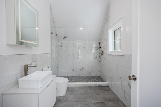 139A N Ferry Rd, Shelter Island, NY 11964 - full bathroom featuring toilet, tiled shower, tile walls, and vanity
