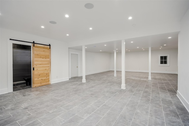 139A N Ferry Rd, Shelter Island, NY 11964 - finished below grade area featuring a barn door, recessed lighting, and baseboards