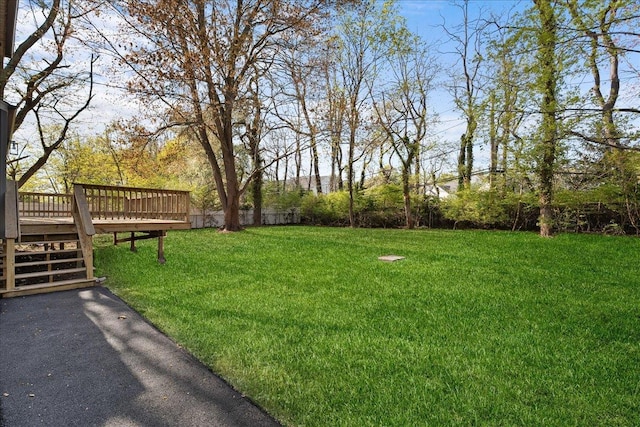 view of yard featuring a deck