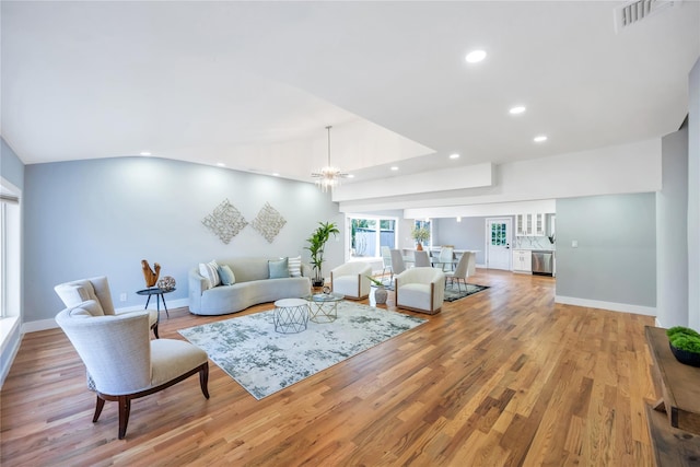 16 Huckleberry Ln, Oyster Bay, NY 11771 - living area with light wood-style flooring, baseboards, visible vents, an inviting chandelier, and recessed lighting