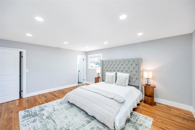 16 Huckleberry Ln, Oyster Bay, NY 11771 - bedroom featuring wood finished floors, baseboards, and recessed lighting