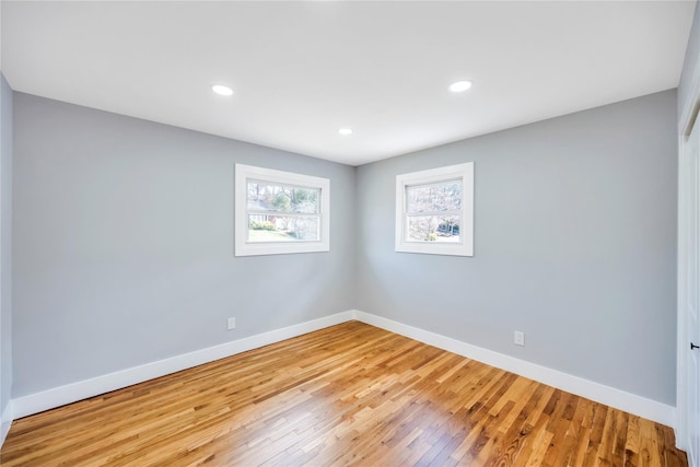 16 Huckleberry Ln, Oyster Bay, NY 11771 - spare room with light wood-type flooring, baseboards, and recessed lighting