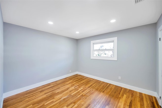 16 Huckleberry Ln, Oyster Bay, NY 11771 - spare room featuring baseboards, light wood-style floors, visible vents, and recessed lighting
