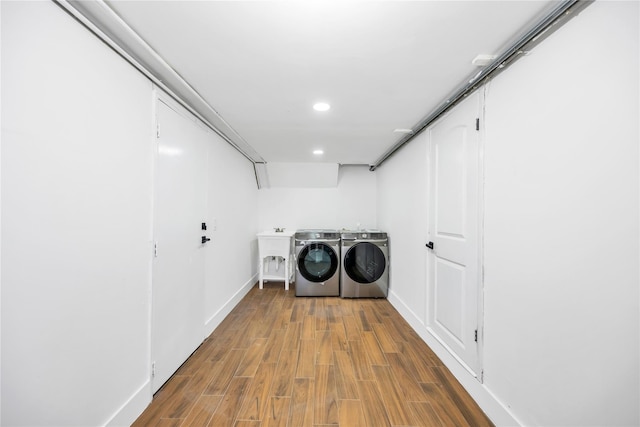16 Huckleberry Ln, Oyster Bay, NY 11771 - laundry room featuring recessed lighting, wood finished floors, baseboards, and washer and clothes dryer