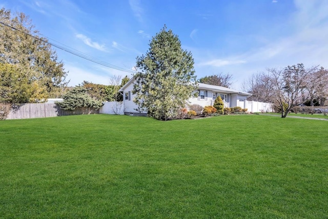 view of yard with fence