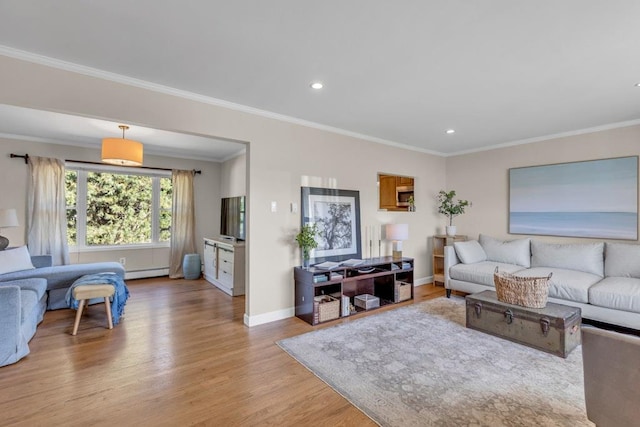 living room with baseboards, ornamental molding, light wood-style floors, recessed lighting, and a baseboard heating unit