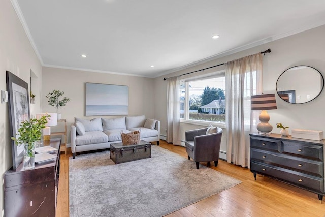 living room with recessed lighting, ornamental molding, and wood finished floors
