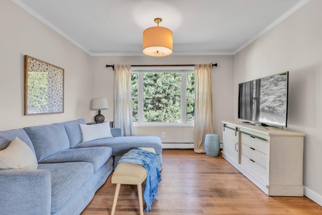 living area with light wood-style floors, a baseboard heating unit, baseboards, and ornamental molding
