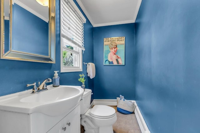 bathroom featuring baseboards, ornamental molding, toilet, vanity, and tile patterned flooring