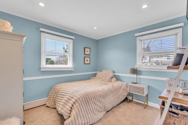 bedroom featuring a baseboard radiator, baseboards, ornamental molding, and carpet