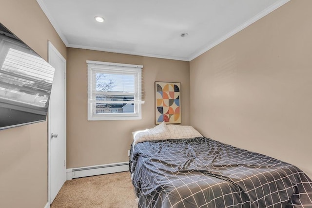 bedroom with baseboard heating, carpet flooring, and ornamental molding
