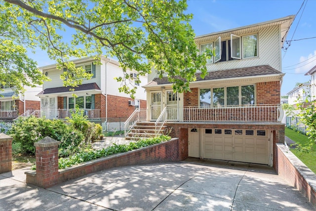 146-38 26th Ave, Flushing, NY 11354 - view of front of property with concrete driveway, a garage, and brick siding