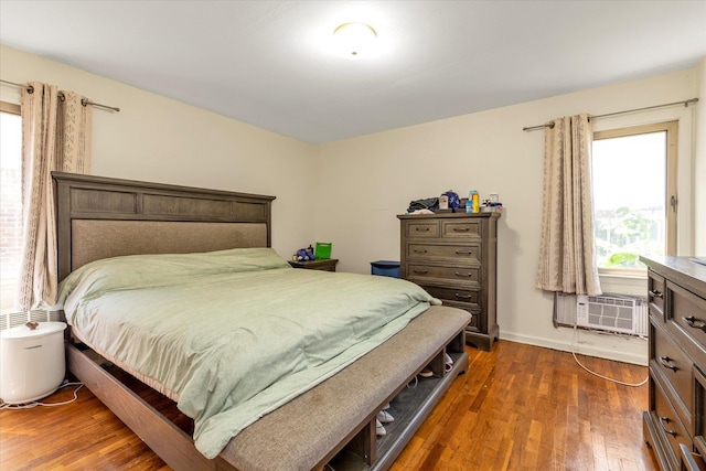 146-38 26th Ave, Flushing, NY 11354 - bedroom featuring dark wood-style floors and a wall mounted air conditioner
