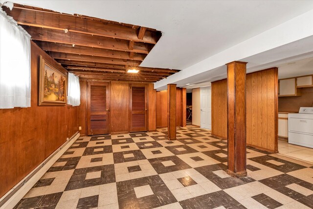 146-38 26th Ave, Flushing, NY 11354 - finished below grade area featuring washer / dryer, tile patterned floors, and wood walls