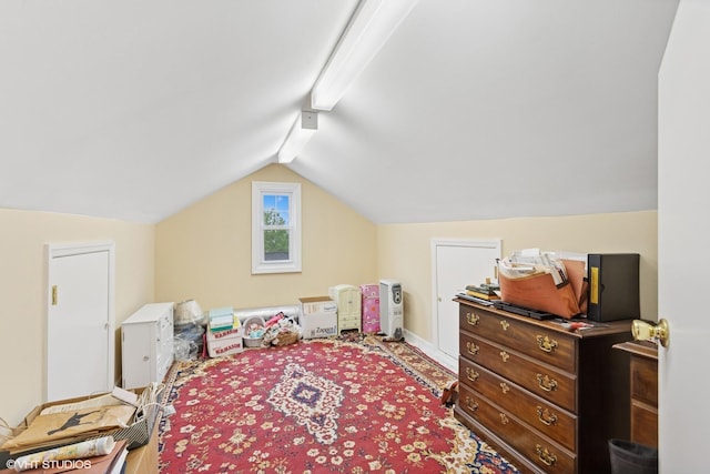 bedroom with lofted ceiling