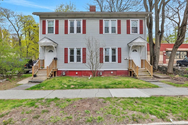 125-127 S Ave, Poughkeepsie, NY 12601 - colonial inspired home featuring crawl space, a front yard, and a chimney