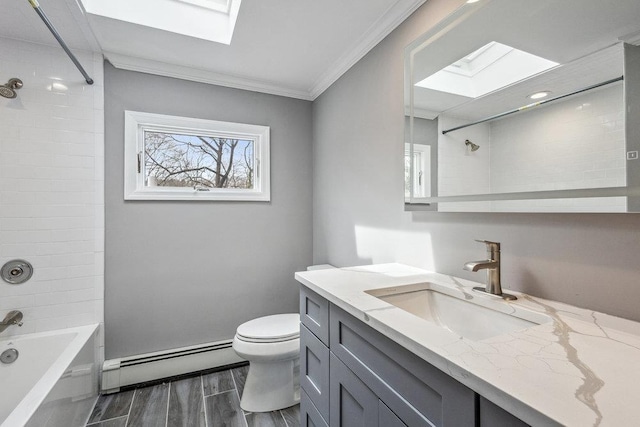 37 Soundview Rd, Huntington, NY 11743 - bathroom featuring a skylight, a baseboard radiator, vanity, toilet, and ornamental molding