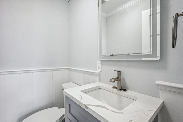 37 Soundview Rd, Huntington, NY 11743 - bathroom featuring toilet, vanity, a wainscoted wall, and crown molding