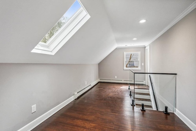 37 Soundview Rd, Huntington, NY 11743 - bonus room featuring a baseboard heating unit, a skylight, wood finished floors, recessed lighting, and vaulted ceiling