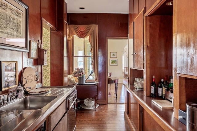 35 S Penataquit Ave, Bay Shore, NY 11706 - kitchen featuring stainless steel countertops, dark wood-style flooring, modern cabinets, and brown cabinets