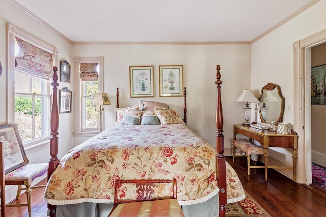 35 S Penataquit Ave, Bay Shore, NY 11706 - bedroom featuring wood-type flooring, ornamental molding, and baseboards