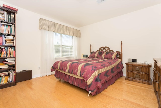 121-10 Powells Cove Blvd Unit C, College Point, NY 11356 - bedroom with wood finished floors and baseboards